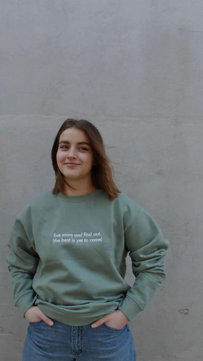 Girl wearing THE HOPEFUL CREWNECK